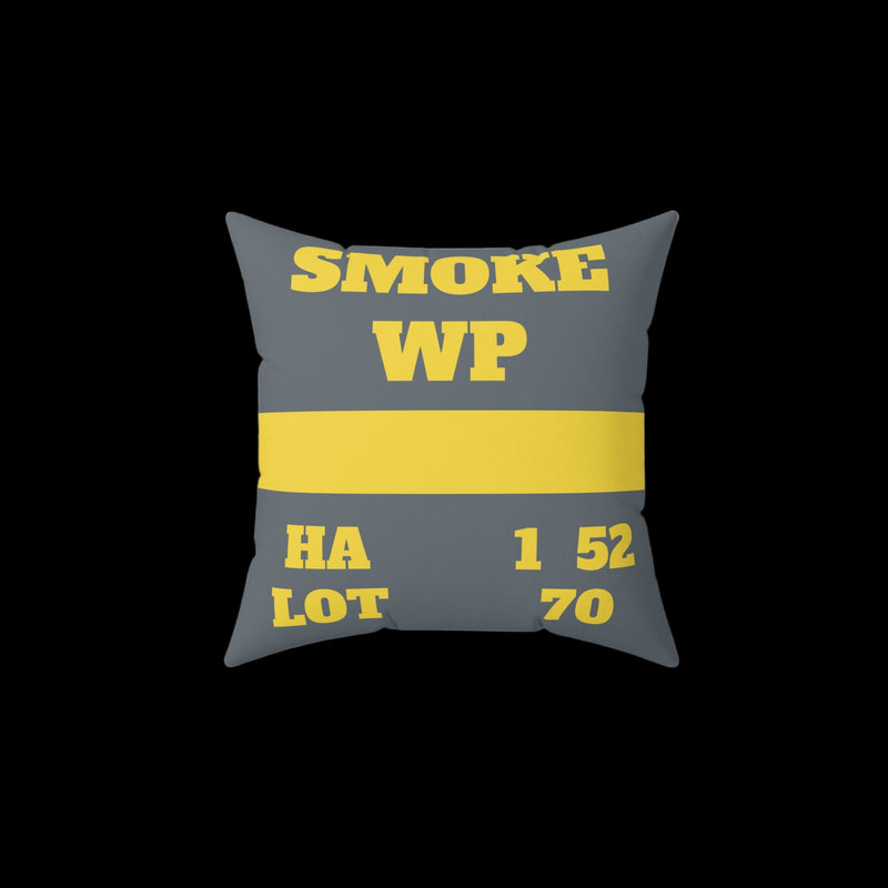 Gray pillow with yellow text and numbers on a white background